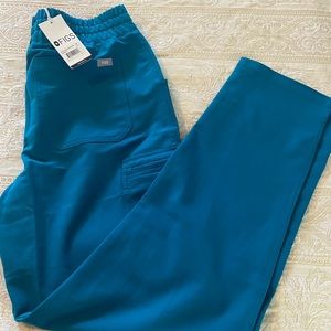 Brand new with tag in original packaging.